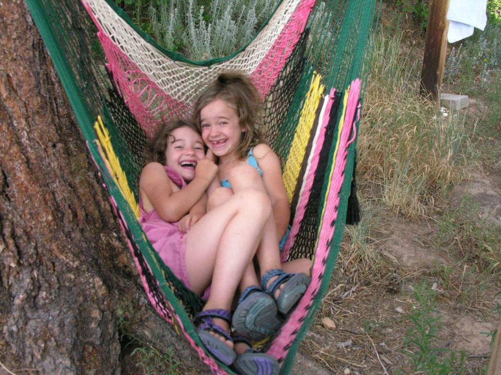 two girls in a hammock